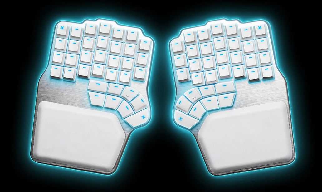 Dygma Defy keyboard. A Split keyboard with a columnar layout, a bunch of thumb keys, and all dashes instead of letters on the keycaps