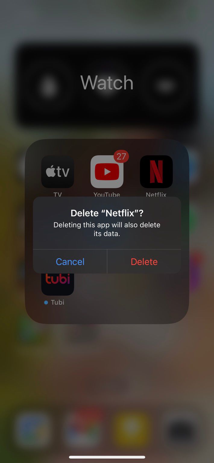 Screenshot showing Netflix app being deleted from phone