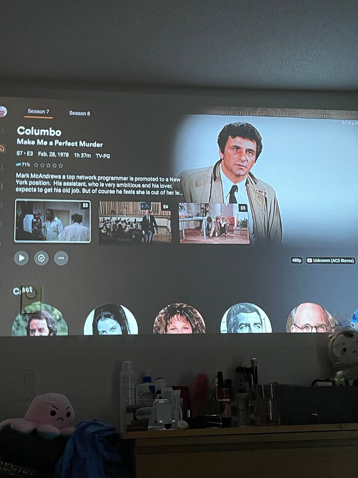 Projector screen showing the Plex app, with a Columbo episode selected: Make Me A Perfect Murder